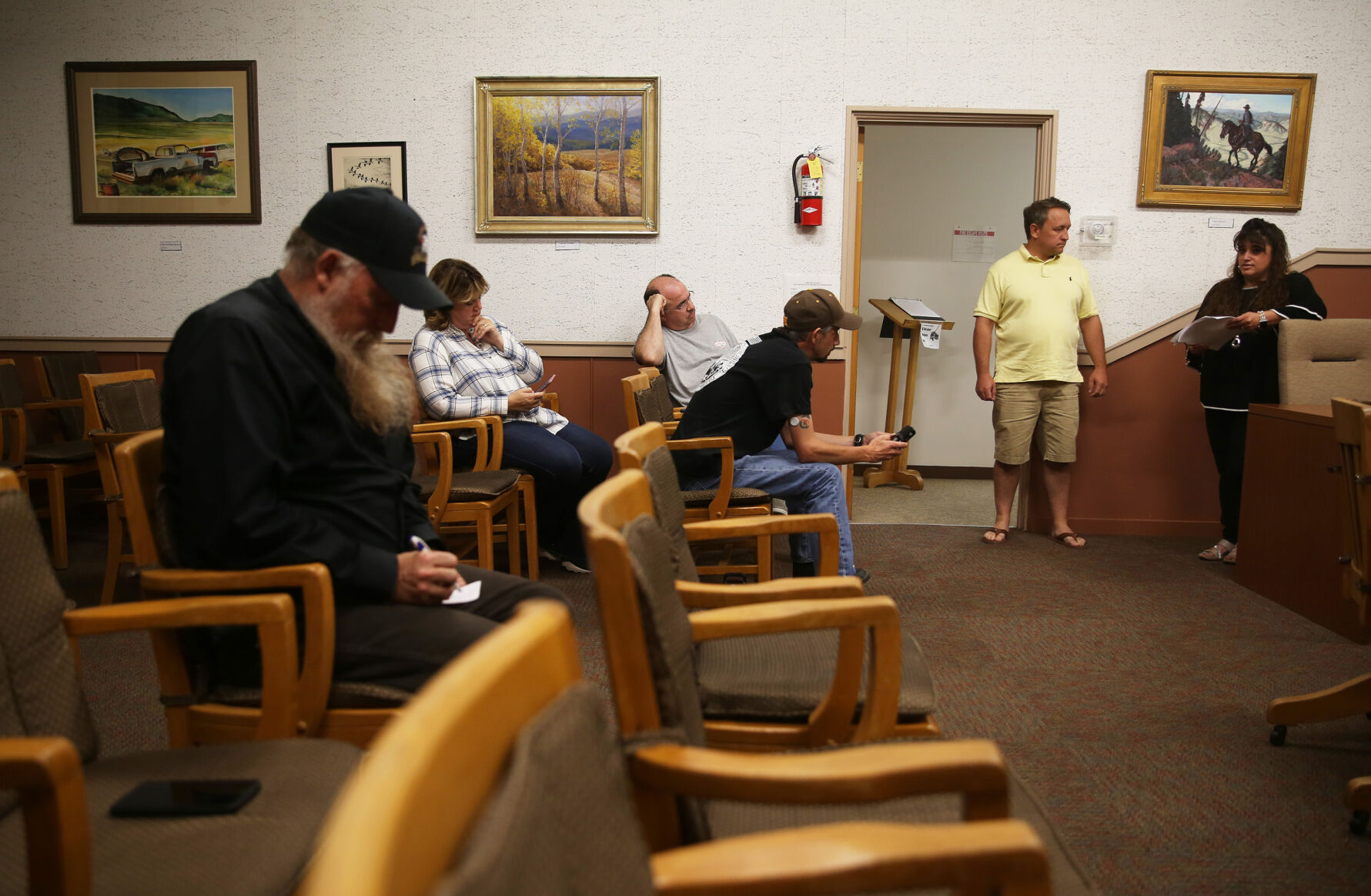 Brandi Carder, right, stands with County Commissioner Bill Novotny